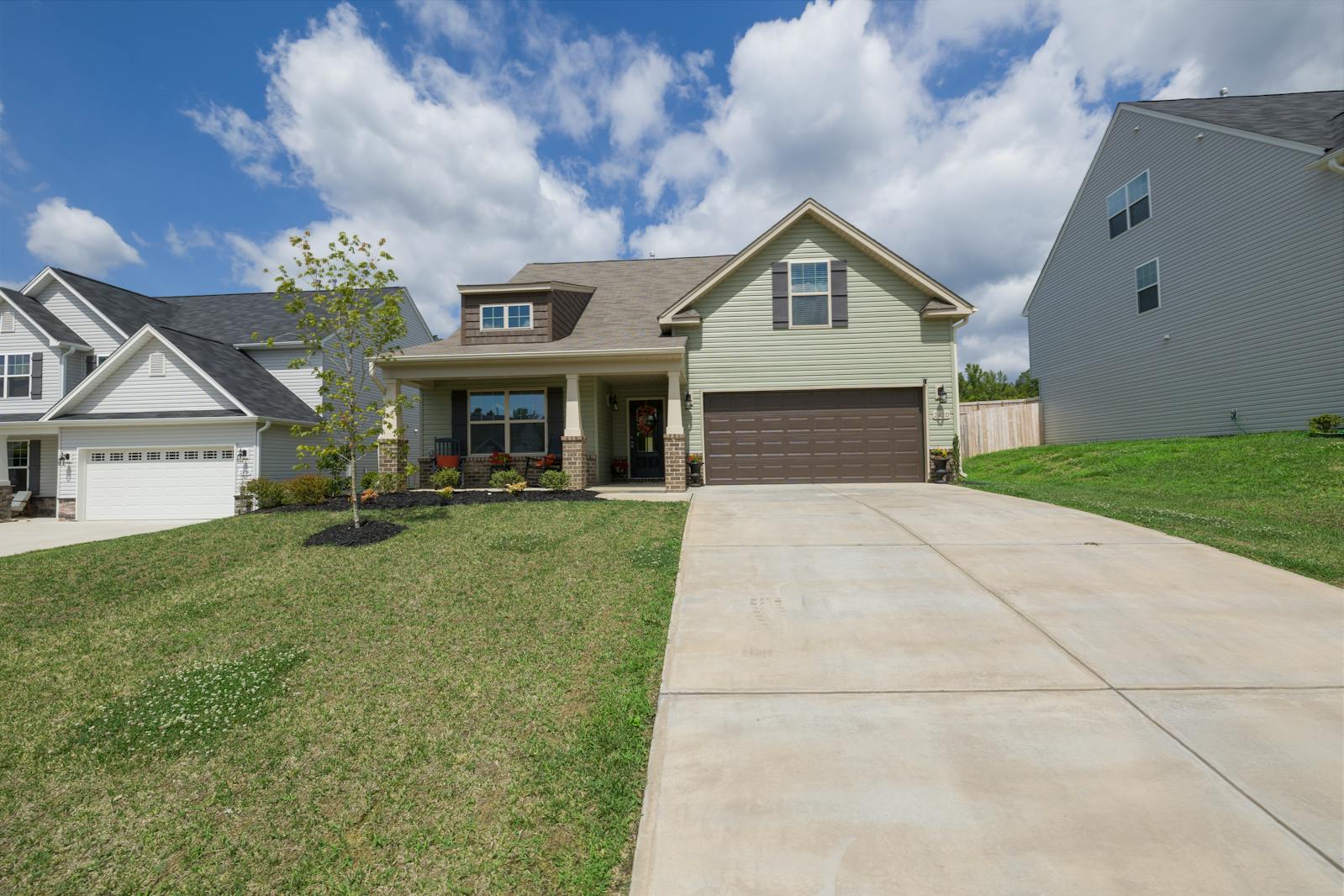 Clean concrete driveway after pressure washing in Hoover AL
